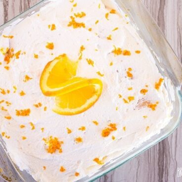 This Orange Creamsicle Icebox Cake taste just like your favorite creamy, dreamy popsicle!