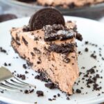 A piece of Oreo chocolate cake on a plate