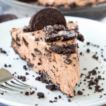 A piece of Oreo chocolate cake on a plate