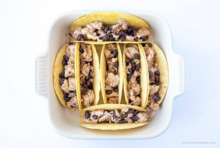 Chicken & Black Bean Oven Baked Tacos - so quick and easy they are perfect for busy weeknight dinners.