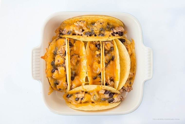 Chicken & Black Bean Oven Baked Tacos - so quick and easy they are perfect for busy weeknight dinners.