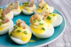 Deviled Eggs Benedict is a cross between two of my most beloved bites! These eggs are super easy to make and they disappear as fast as you can make them!