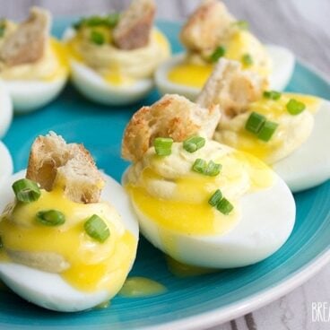 Deviled Eggs Benedict is a cross between two of my most beloved bites! These eggs are super easy to make and they disappear as fast as you can make them!