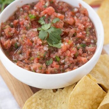 A bowl of Salsa with chips