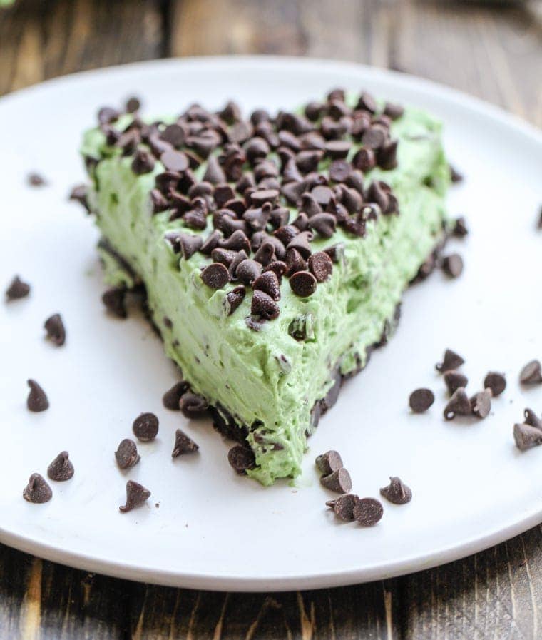 This No Bake Mint Chocolate Chip Pie is fast, easy, and filled with chocolate chips and mint candies. It's the perfect summer night treat!