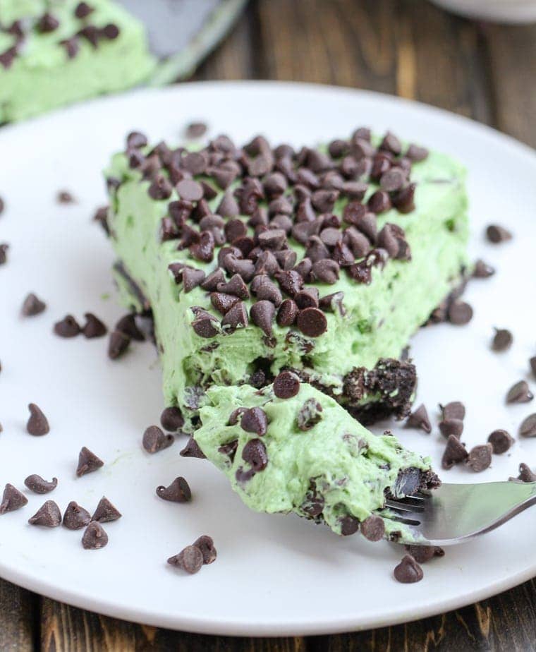 This No Bake Mint Chocolate Chip Pie is fast, easy, and filled with chocolate chips and mint candies. It's the perfect summer night treat! 