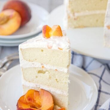 A slice of Peach Cake on a plate
