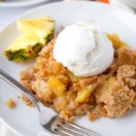 A plate of Pineapple Cobbler with ice cream