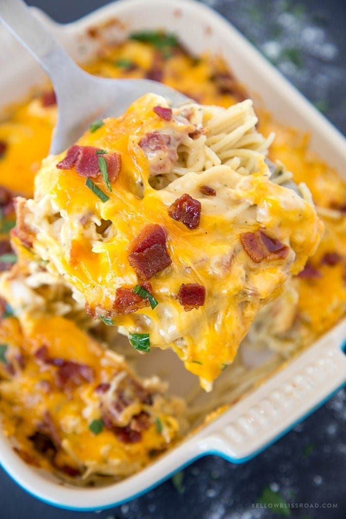 Creamy Chicken, Bacon and Ranch Baked Spaghetti - Cooked noodles, shredded chicken and crispy bacon smothered in a creamy Cheddar Ranch Sauce.