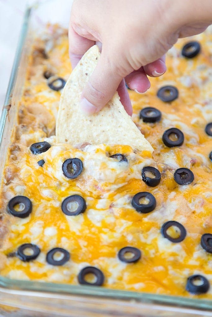 Creamy Taco Dip - a hearty, beefy, cheesy dip that's perfect for game day or any other day!