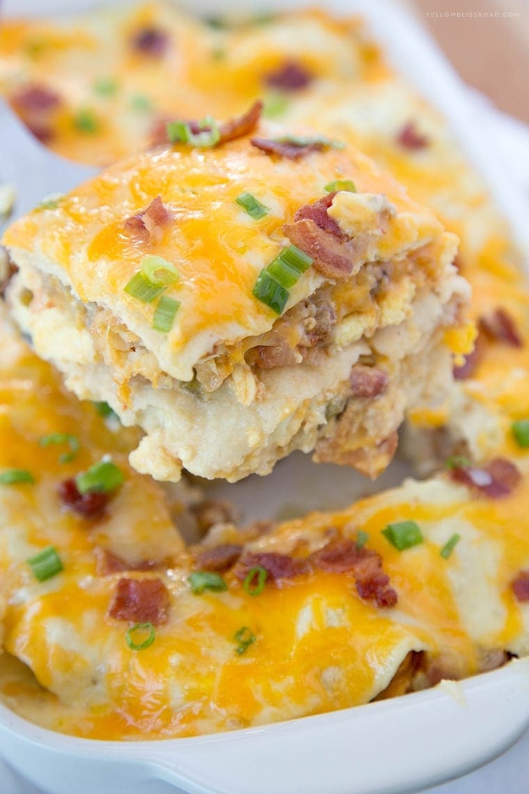 Breakfast Enchilada Casserole Recipe - a layered breakfast dish with a Mexican twist! Perfect for breakfast, brunch or dinner.