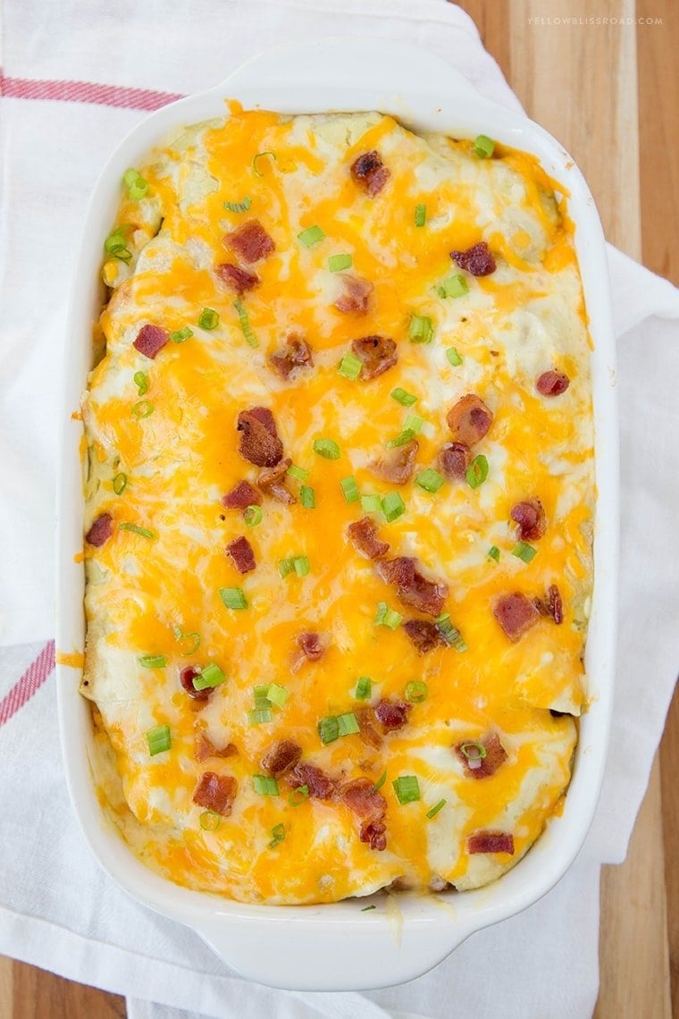 Breakfast Enchilada Casserole Recipe - a layered breakfast dish with a Mexican twist! Perfect for breakfast, brunch or dinner.