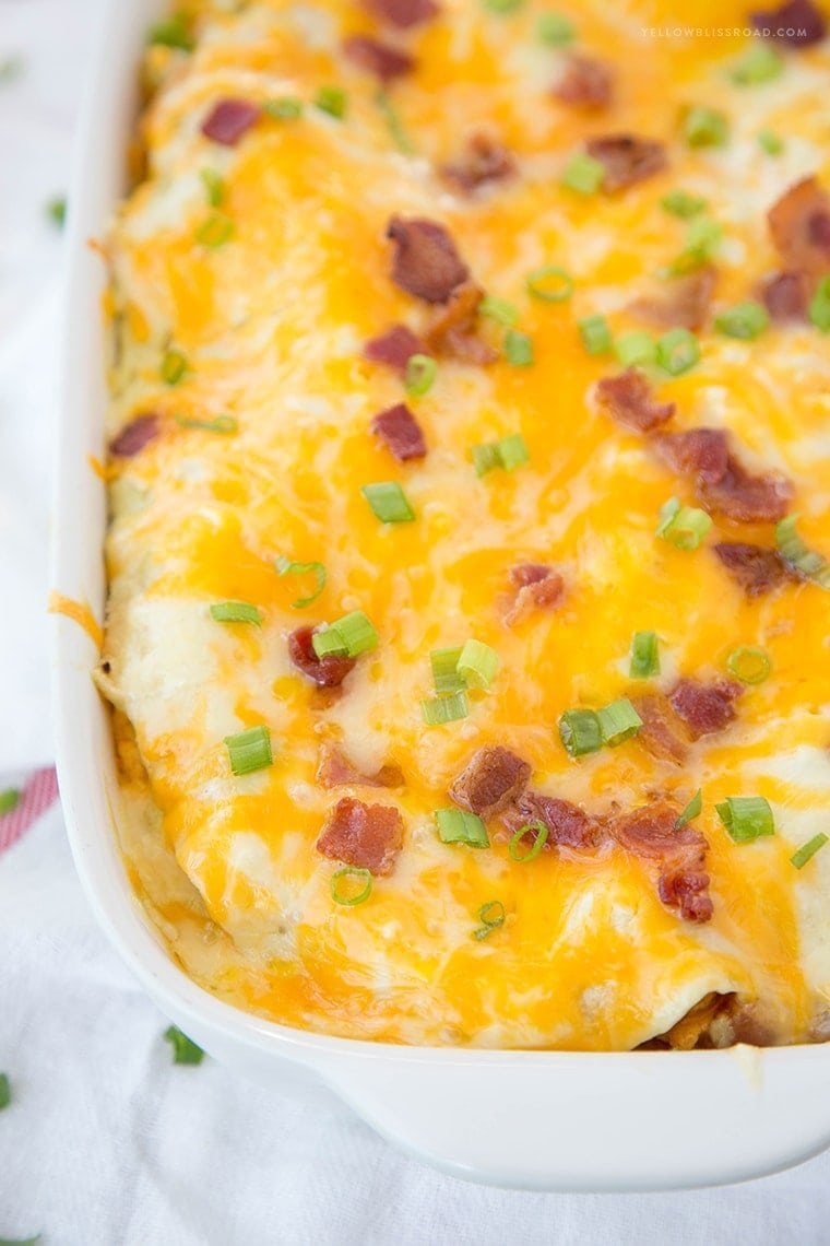 Breakfast Enchilada Casserole Recipe - a layered breakfast dish with a Mexican twist! Perfect for breakfast, brunch or dinner.