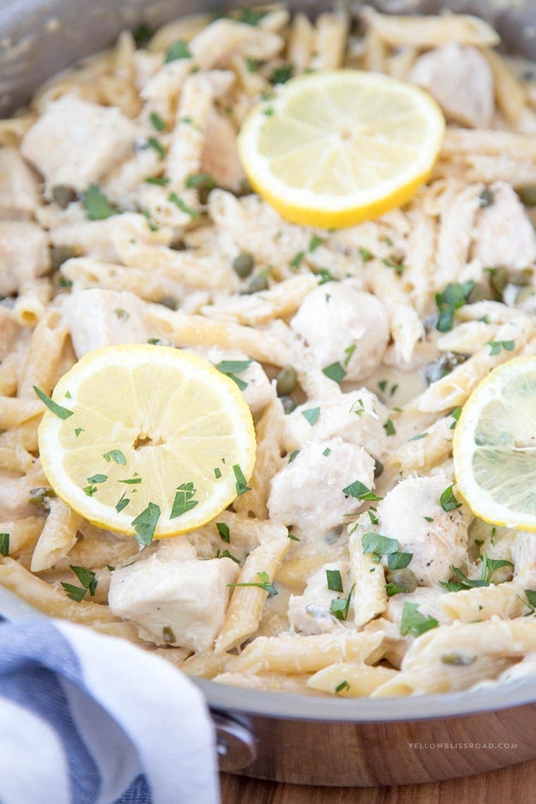 One Pan Creamy Lemon Chicken Picatta Pasta - Tender chicken and pasta are coated with a luscious lemony cream sauce with capers. Easy weeknight dinner that's classy enough for company.