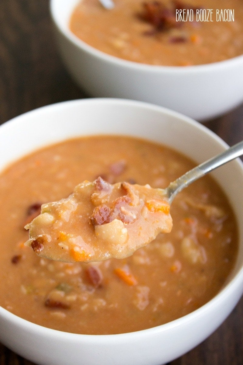 A spoonful of bacon and bean soup.