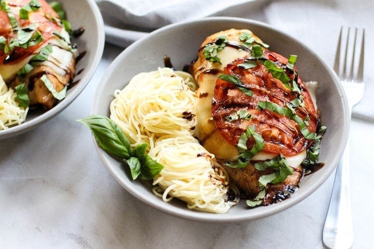 This Baked Chicken Caprese is full of bright summery flavors and is so easy to throw together!