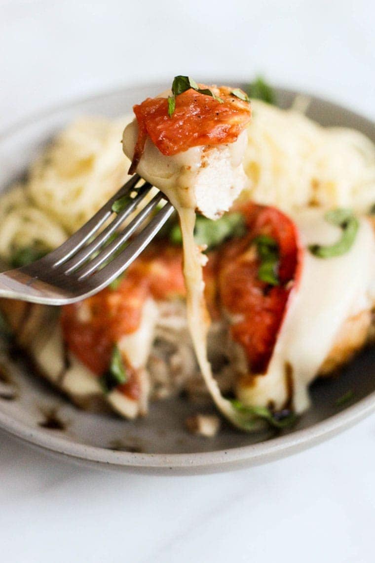 This Baked Chicken Caprese is full of bright summery flavors and is so easy to throw together!