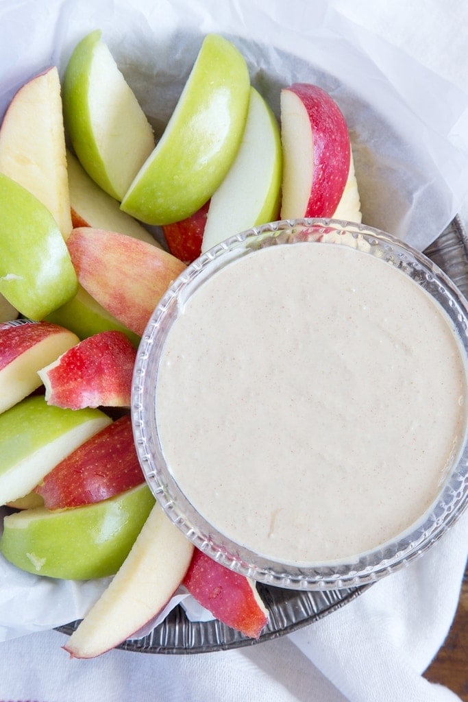 Lightened Up Cinnamon Caramel Apple Dip - Delicious and sweet and lighter than traditional caramel dips, this crowd pleasing dip is a kid friendly dessert or snack.