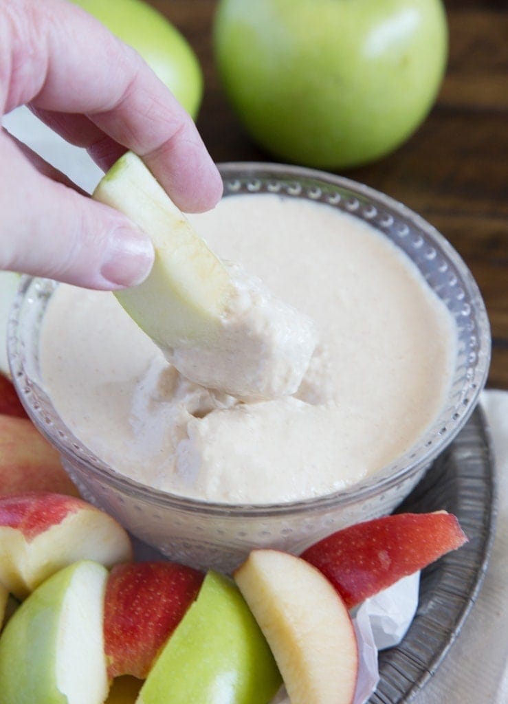 Lightened Up Cinnamon Caramel Apple Dip - Delicious and sweet and lighter than traditional caramel dips, this crowd pleasing dip is a kid friendly dessert or snack.