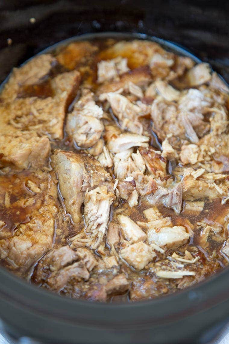 Slow Cooker Brown Sugar & Garlic Teriyaki Pork - Just a few ingredients make this crock pot meal a sure winner for your busy weeknight dinner. Just add rice and veggies for a complete meal!