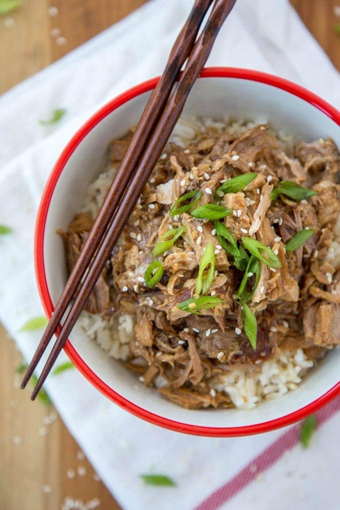 Slow Cooker Brown Sugar & Garlic Teriyaki Pork - Just a few ingredients make this crock pot meal a sure winner for your busy weeknight dinner. Just add rice and veggies for a complete meal!