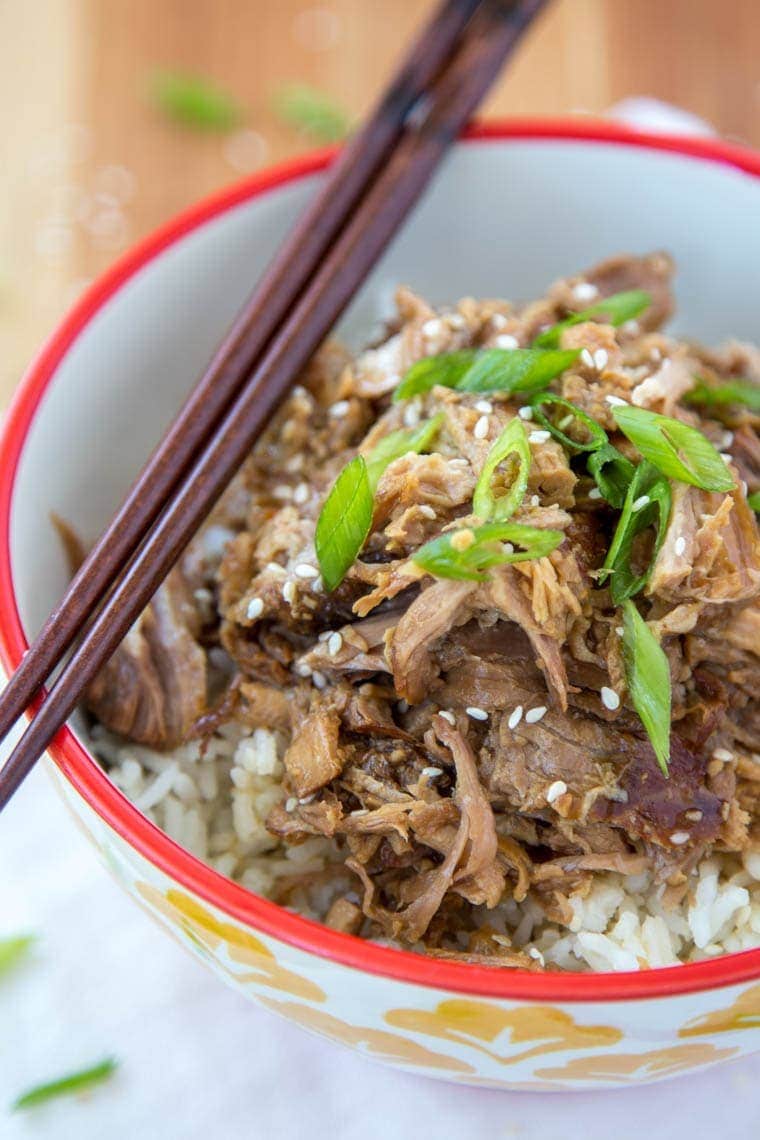 Slow Cooker Brown Sugar & Garlic Teriyaki Pork - Just a few ingredients make this crock pot meal a sure winner for your busy weeknight dinner. Just add rice and veggies for a complete meal!