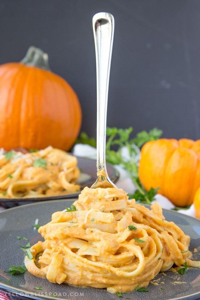 Creamy Pumpkin Alfredo - A perfect fall dinner that's easy enough for a weeknight meal and you'll never miss the cream!