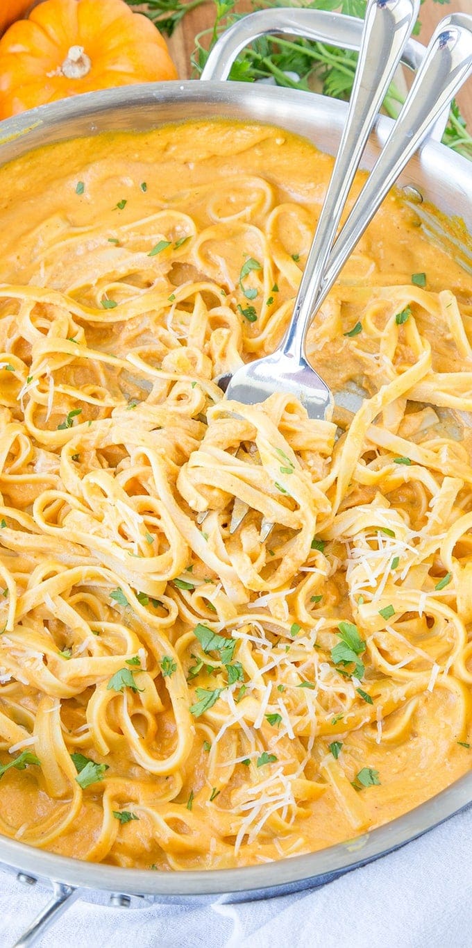 A pan of fettuccine with pumpkin alfredo sauce