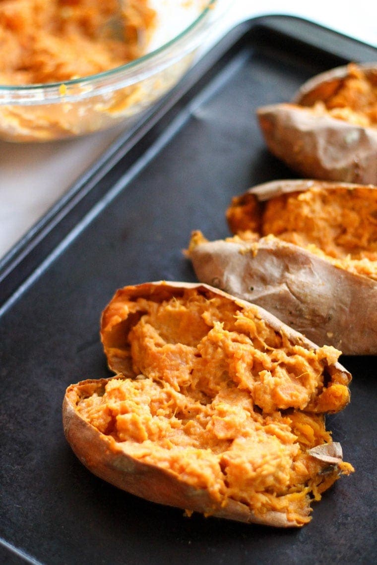 These Twice Baked Sweet Potatoes are full of fall flavors and make for a great side dish for Thanksgiving or any time this fall!