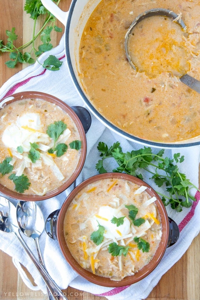 Green Chile Chicken Enchilada Soup - A rich and creamy Mexican inspired soup. It's like enchiladas in a bowl!
