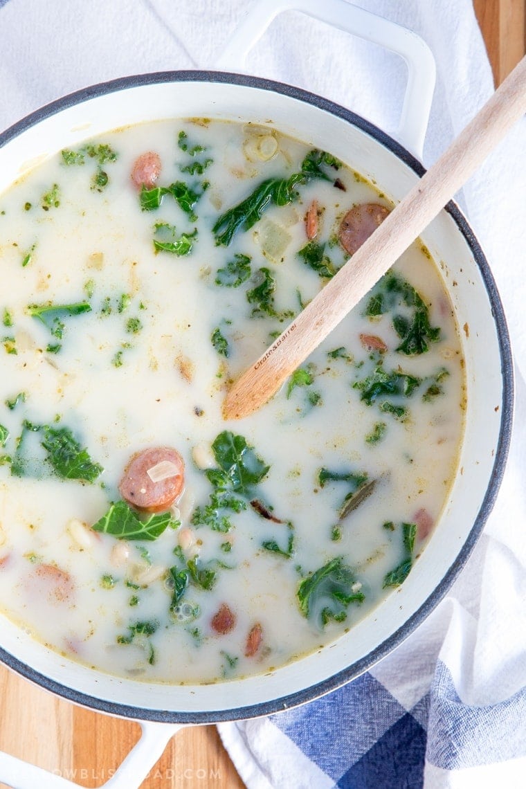 Andouille sausage, white beans and kale in a creamy broth