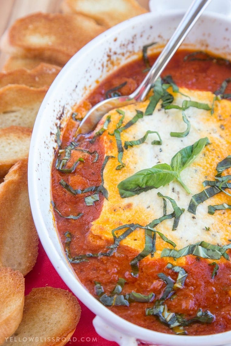Baked Goat Cheese & Marinara Dip with Crostini - A festive holiday appetizer!