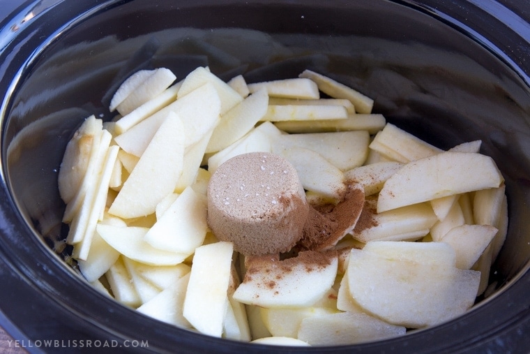 This Slow Cooker Caramel Apple Spice Cake is just the right dessert for your holiday gatherings. It's sweet, with moist spice cake and tender, tart apples.