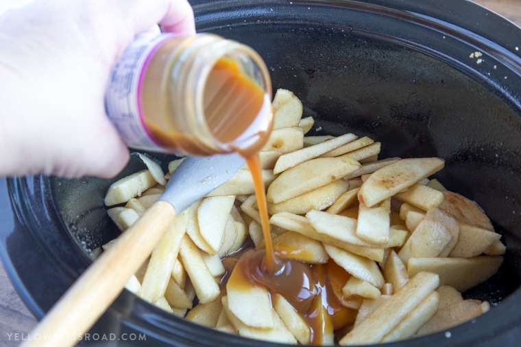 This Slow Cooker Caramel Apple Spice Cake is just the right dessert for your holiday gatherings. It's sweet, with moist spice cake and tender, tart apples.