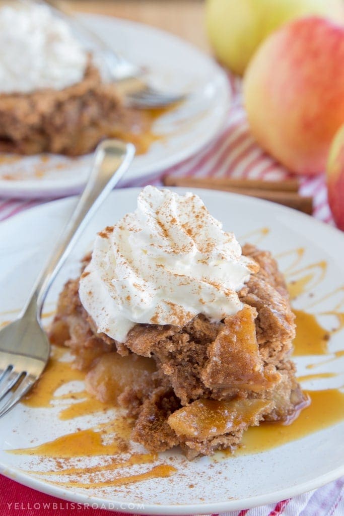 This Slow Cooker Caramel Apple Spice Cake is just the right dessert for your holiday gatherings. It's sweet, with moist spice cake and tender, tart apples.