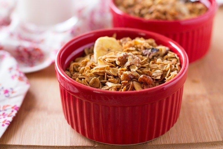 Banana Crunch Granola. Tastes just like banana bread! This healthy breakfast recipe is full of fiber, with half the sugar of regular granola!