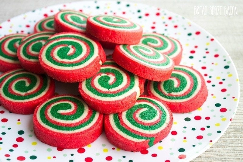 A plate of stacked pinwheel christmas cookies