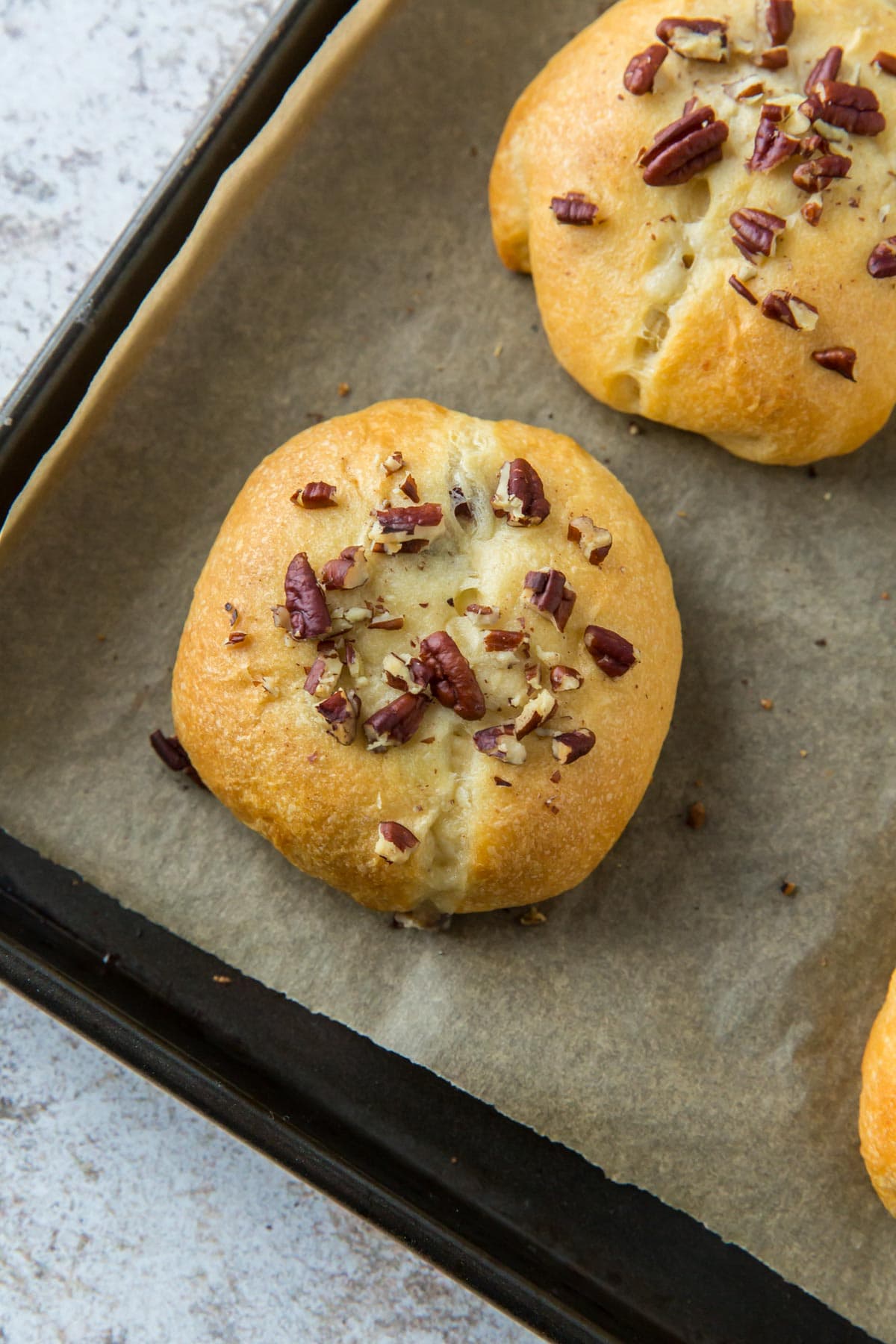 baking sheet, parchment paper, baked cranbrerry chicken puffs with pecans