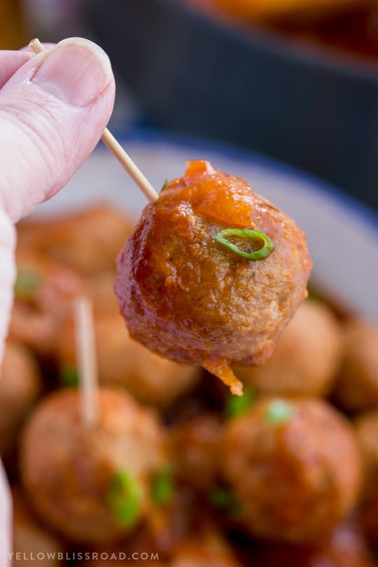 Turkey Meatballs smothered in a homemade Spicy Pineapple Barbecue Sauce. These meatballs are great for as a party appetizer or as a dinner entree!