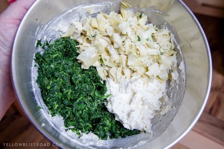 Spinach Artichoke Dip ingredients in a bowl.