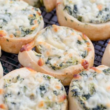 A close up of Artichoke Spinach pinwheels