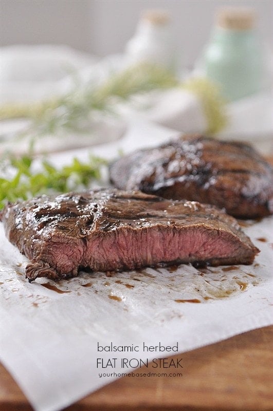 A piece of steak on a cutting board 