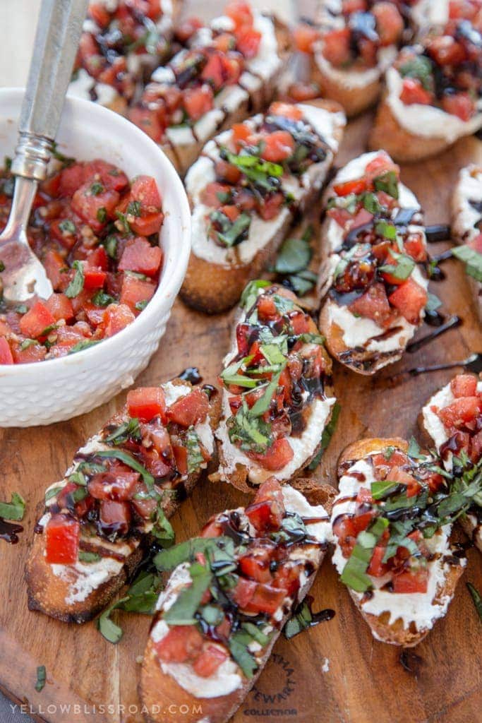 Creamy Three Cheese Bruschetta with Goat Cheese, Cream Cheese and Parmesan. An elegant and classy appetizer that everyone will love!