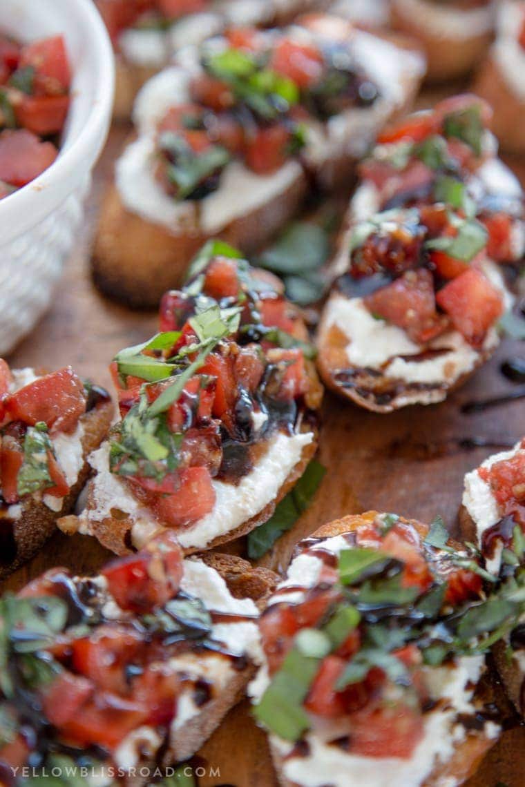 Creamy Three Cheese Bruschetta with Goat Cheese, Cream Cheese and Parmesan. An elegant and classy appetizer that everyone will love!