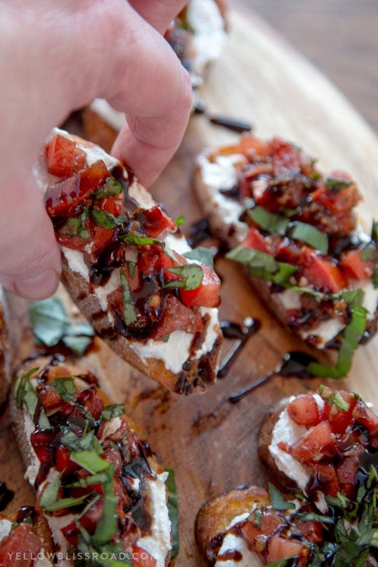 Creamy Three Cheese Bruschetta with Goat Cheese, Cream Cheese and Parmesan. An elegant and classy appetizer that everyone will love!