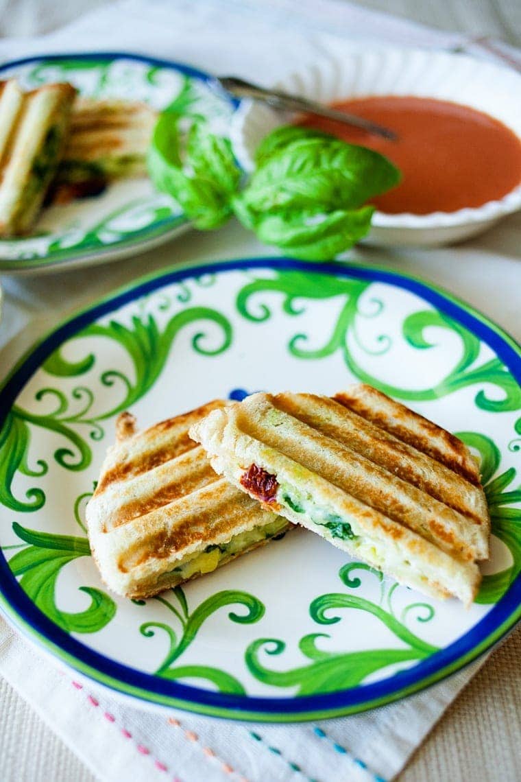 Easily make this Mediterranean Panini with the flavors of sun-dried tomatoes, artichokes, pesto, and more! No panini press needed!