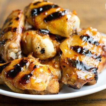 Peach Glazed Chicken Wings are my go to game day wings! Easy to make and packed with flavor!