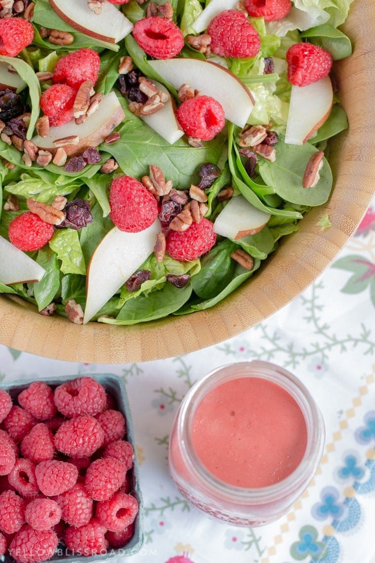 Raspberry & Pear Salad with Homemade Raspberry Vinaigrette - An easy and delicious Salad that is the perfect compliment to any holiday meal.
