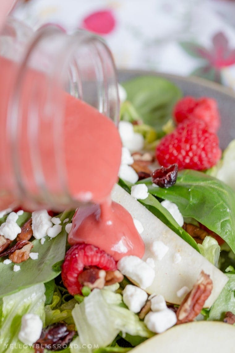 Raspberry & Pear Salad with Homemade Raspberry Vinaigrette - An easy and delicious Salad that is the perfect compliment to any holiday meal.
