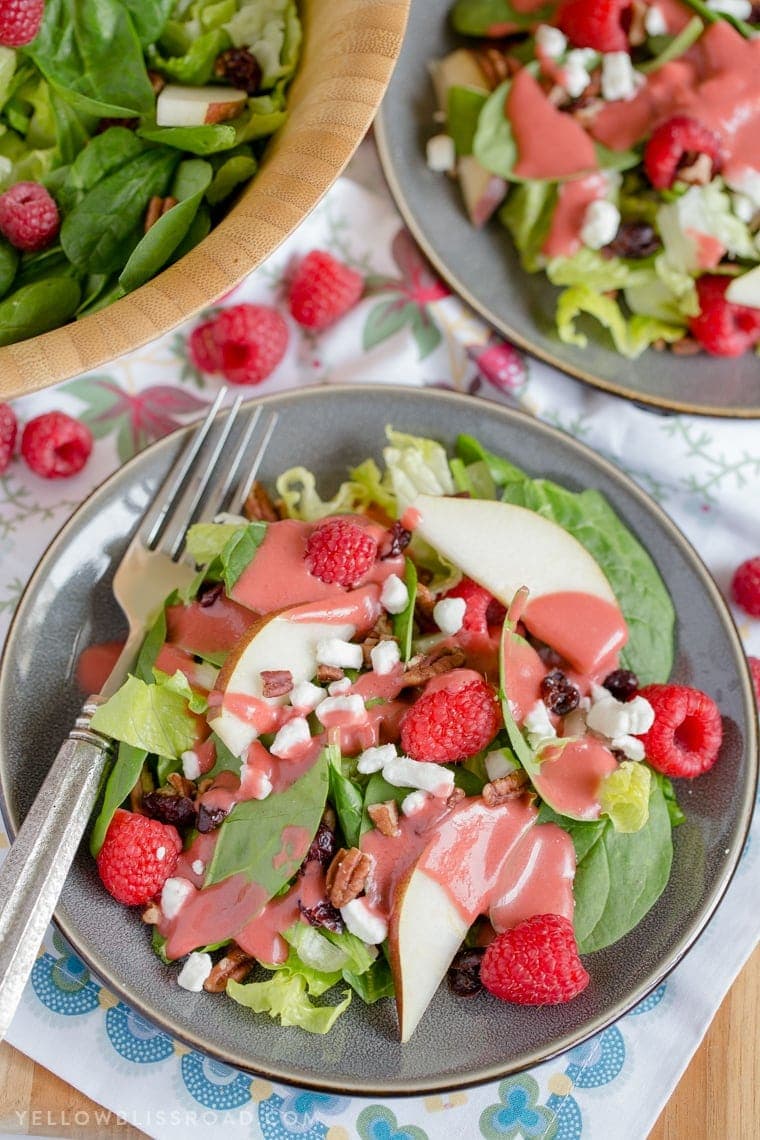Raspberry & Pear Salad with Homemade Raspberry Vinaigrette - An easy and delicious Salad that is the perfect compliment to any holiday meal.